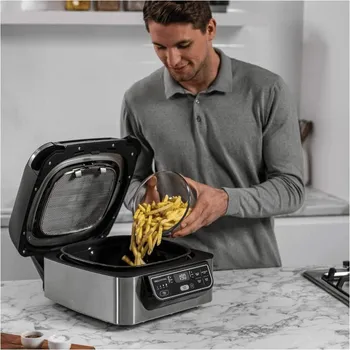 NINJA AG301EU FOODI GRILL & AIR FRYER │ SNAGA: 1750 W │ KAPACITET: 5.7 L │ TEMPERATURA: DO 265°C │ FUNKCIJE: 5 NAČINA KUVANJA │ TEHNOLOGIJA: CIKLONSKI VAZDUH │ SMANJENJE DIMA │ ČIŠĆENJE: DIJELOVI PERIVI U MAŠINI ZA SUĐE, UKLJUČENA ČETKA │ DIMENZIJE: 45 X 36 X 24 CM │ BOJA: CRNA (5 / 5)