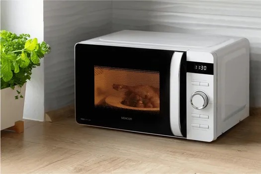 SENCOR SMW 5017WH MIKROTALASNA RERNA │ TIP: MIKROTALASNA RERNA │ SNAGA: 800W │ KAPACITET: 17L │ DIMENZIJE: 451MM X 354MM X 256MM │ MATERIJAL: EMAJL │ BOJA: BELA │ FUNKCIJE: TAJMER, ODMRZAVANJE, ZVUČNI SIGNAL, DEČIJA SIGURNOSNA ZAŠTITA │ KONTROLA: MEHANIČKA │ OSTALO: 8 PROGRAMA, TIHI RAD, LED DISPLEJ (9 / 10)